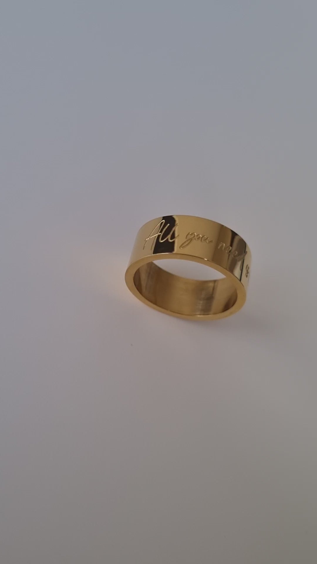 gold band engraved ring